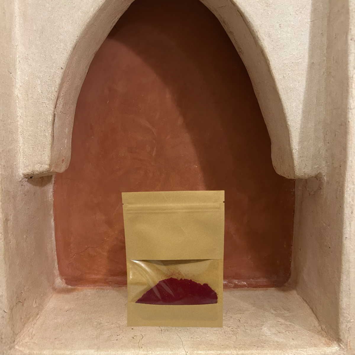 Aker fassi powder inside brown packaging.