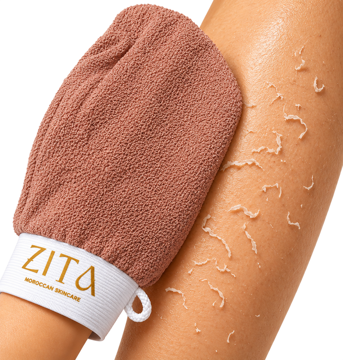 Kessa Glove exfoliating skin on an arm
